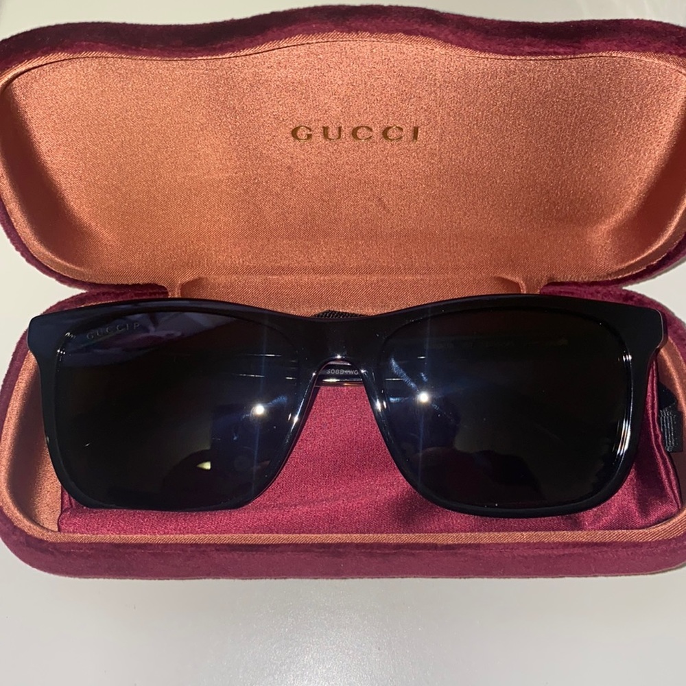 Black authentic Gucci shades for men.